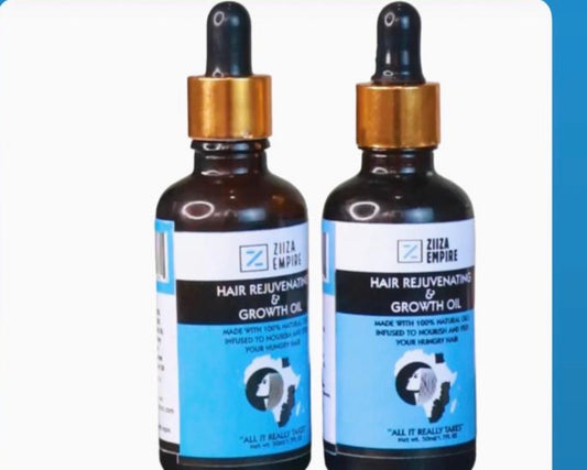 Two bottles of Ziza Empire Hair Rejuvenating and Growth Oil